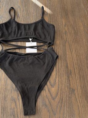 ⭐️NWT Adika Cut out black bodysuit